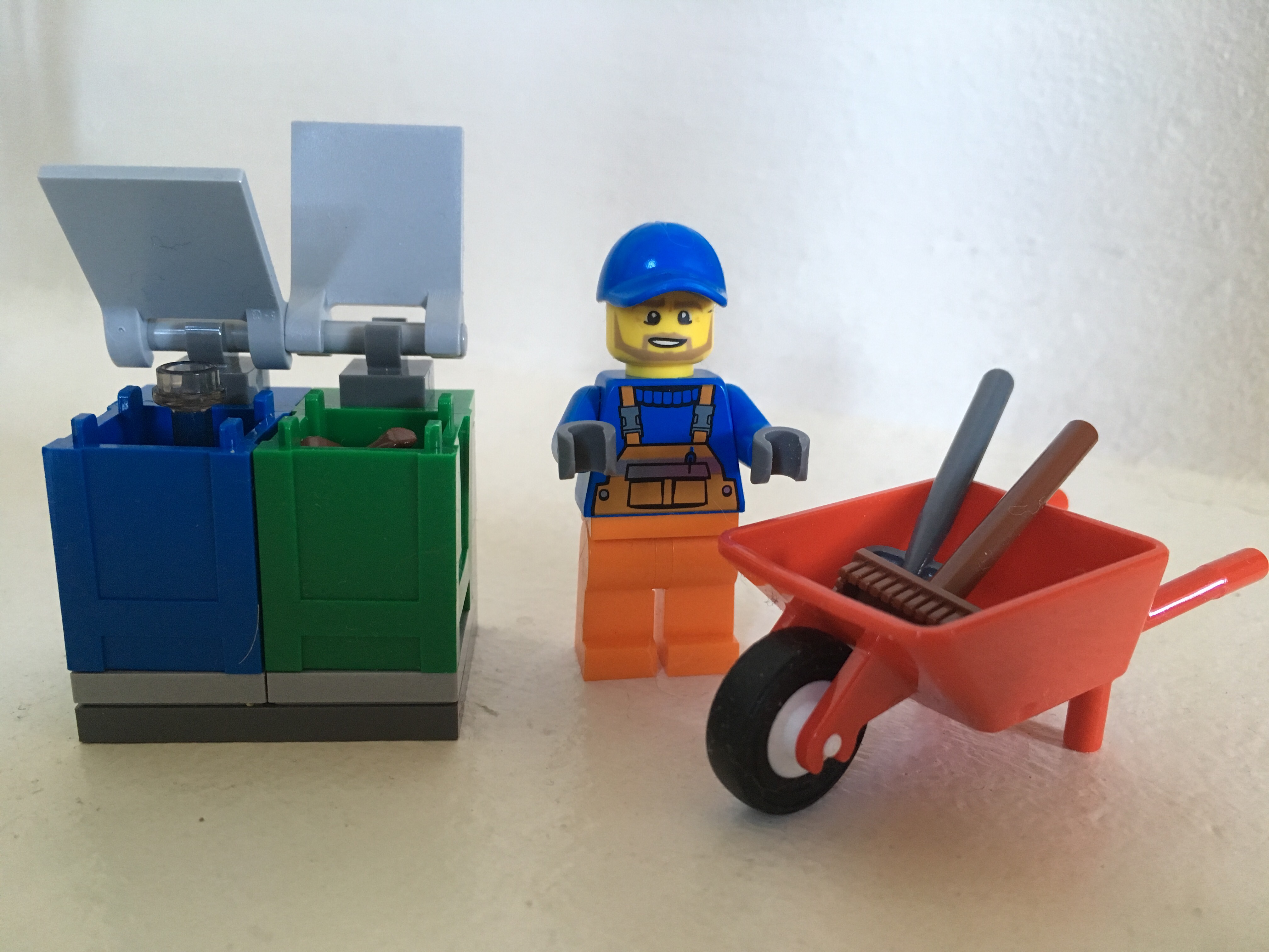 Image of LEGO Garbage Man Minifigure with Wheelbarrow and Trashcans