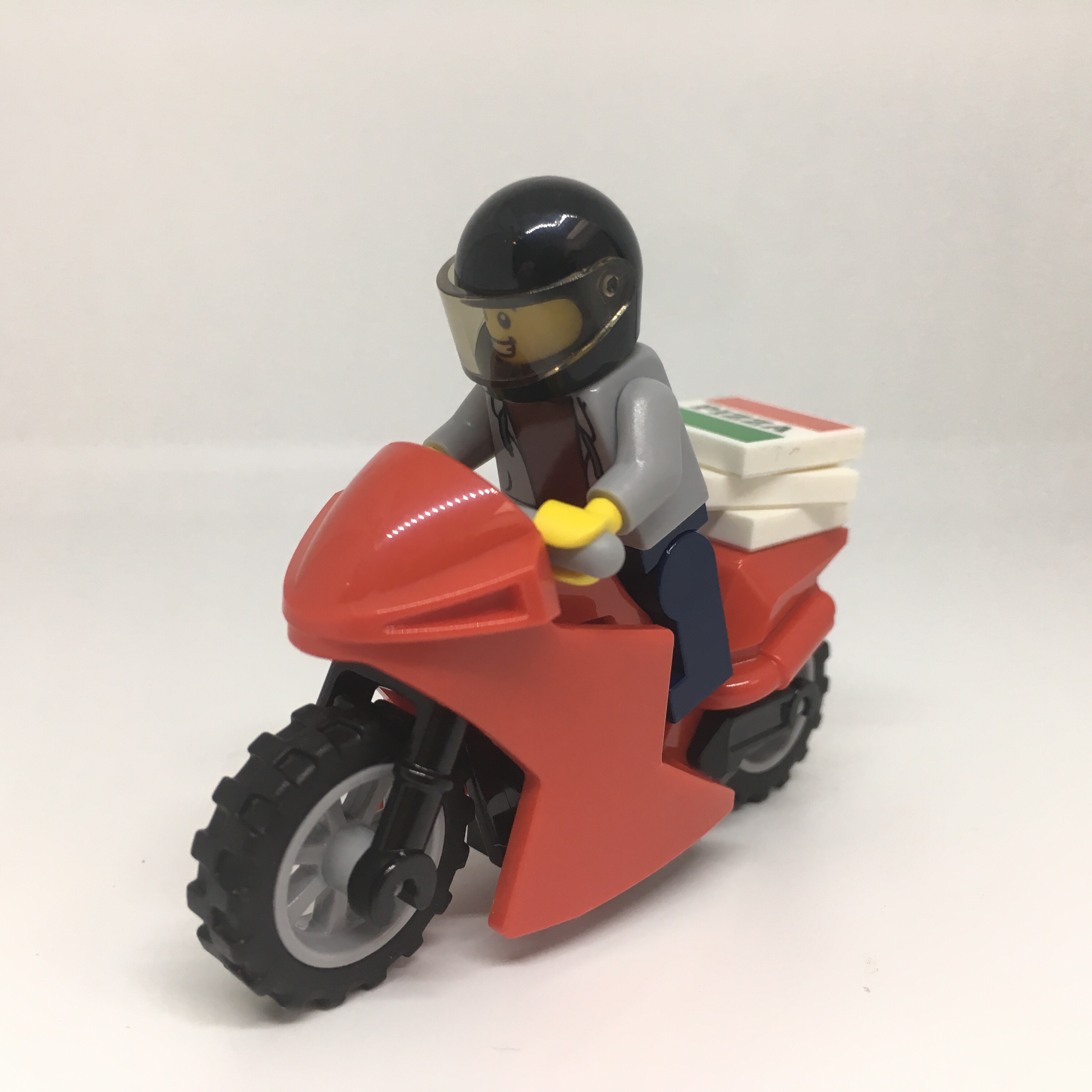 Red lego motorbike with Minifigure 